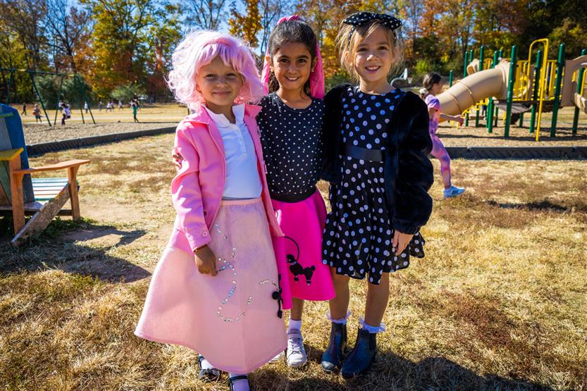 Students dressed in '50s wear smile